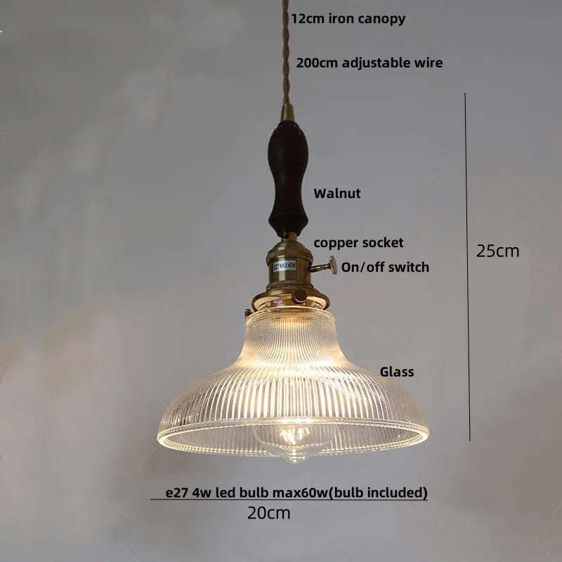 Vintage-style pendant light with labeled components on a neutral background