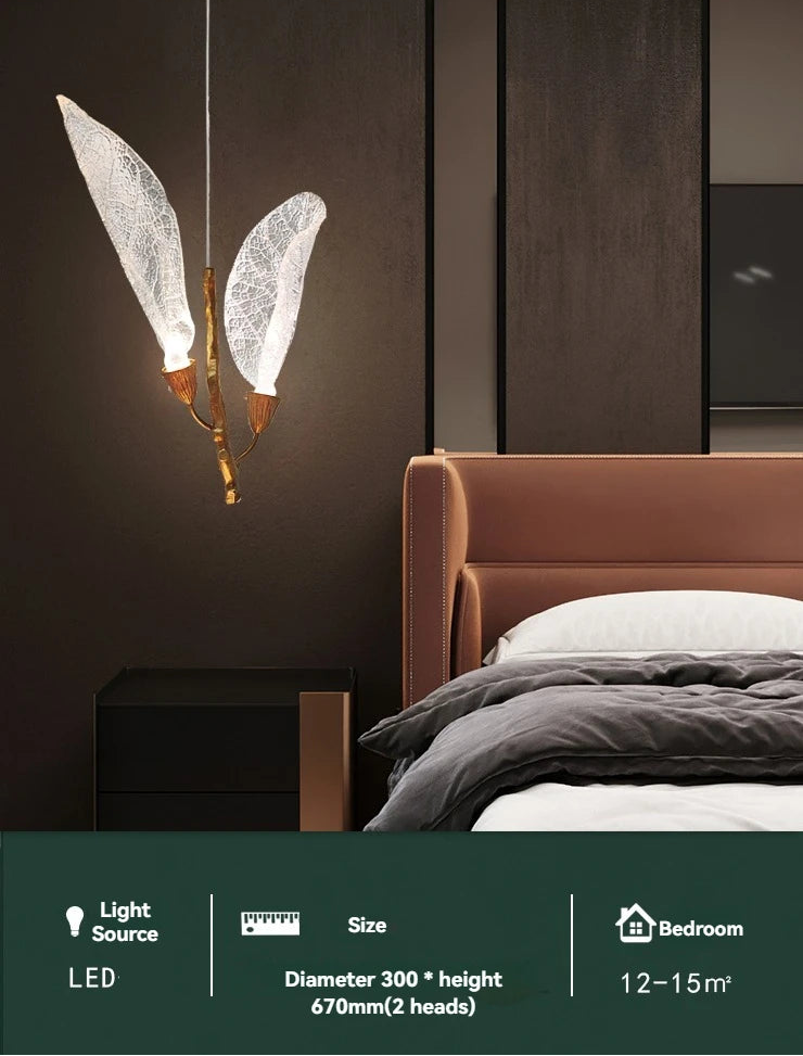 Modern bedroom with a unique pendant light fixture.