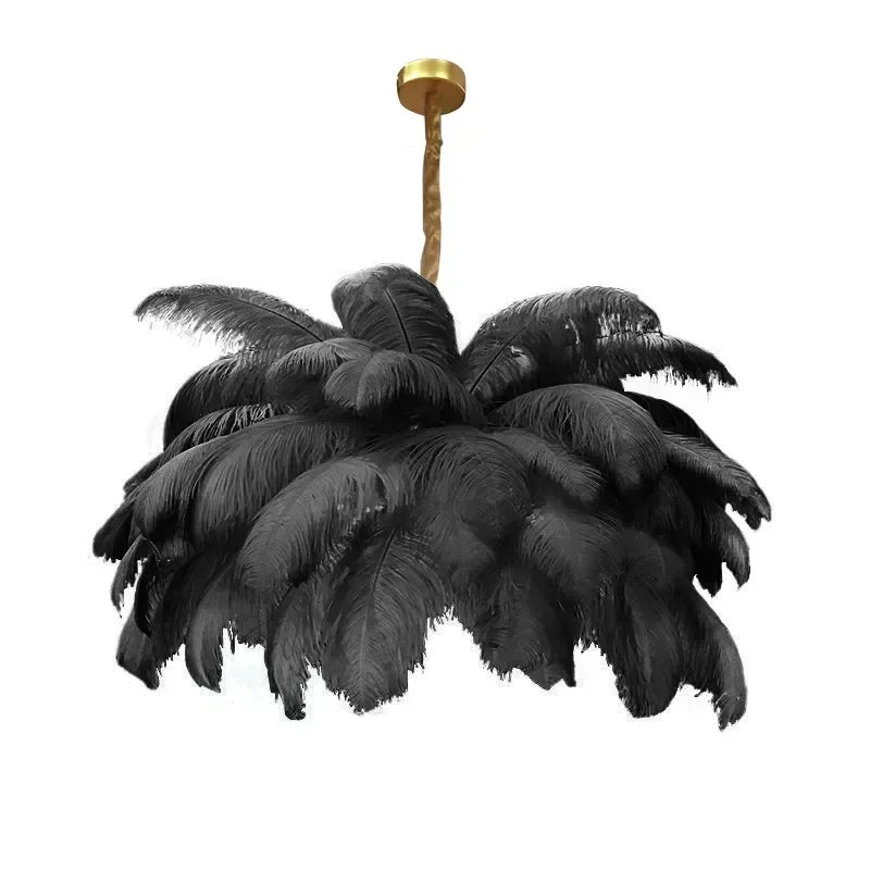 Black feathered chandelier with gold fixture on a white background