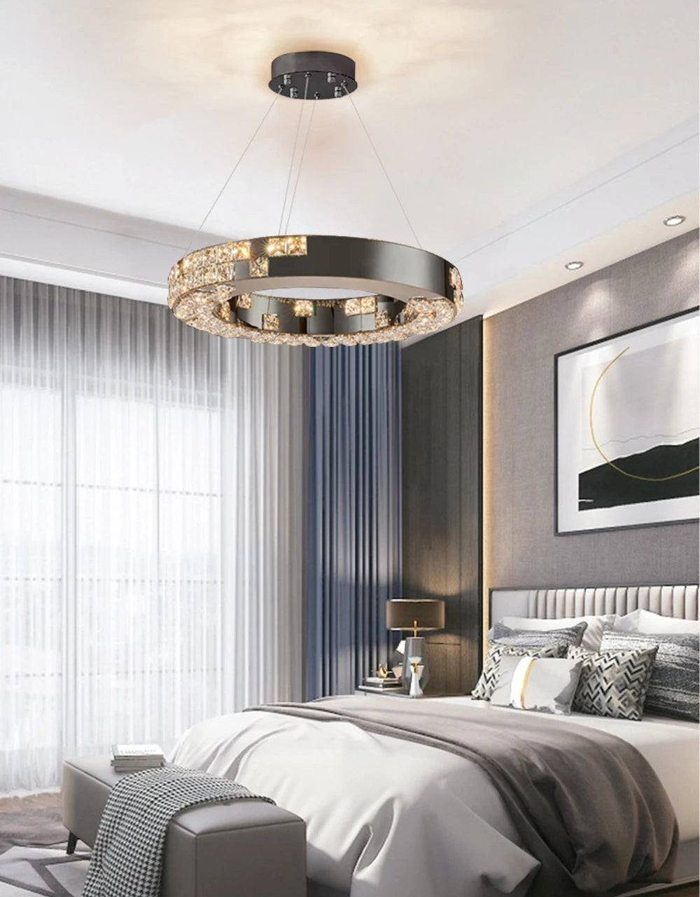 Modern bedroom with a stylish chandelier, bed, and decor.
