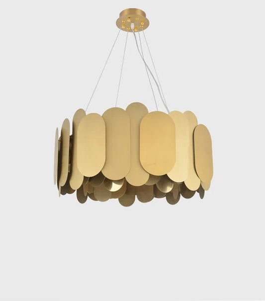 Close-up view of a gold oval link chandelier against a light background