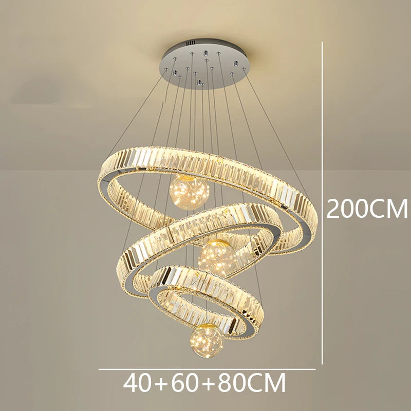 Modern chandelier with three circular rings and labeled dimensions on a neutral background