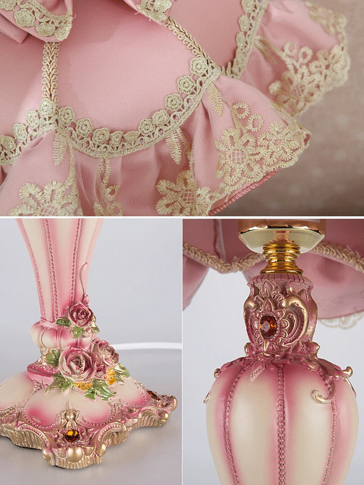 Decorative pink and gold lamp with intricate designs on a light background