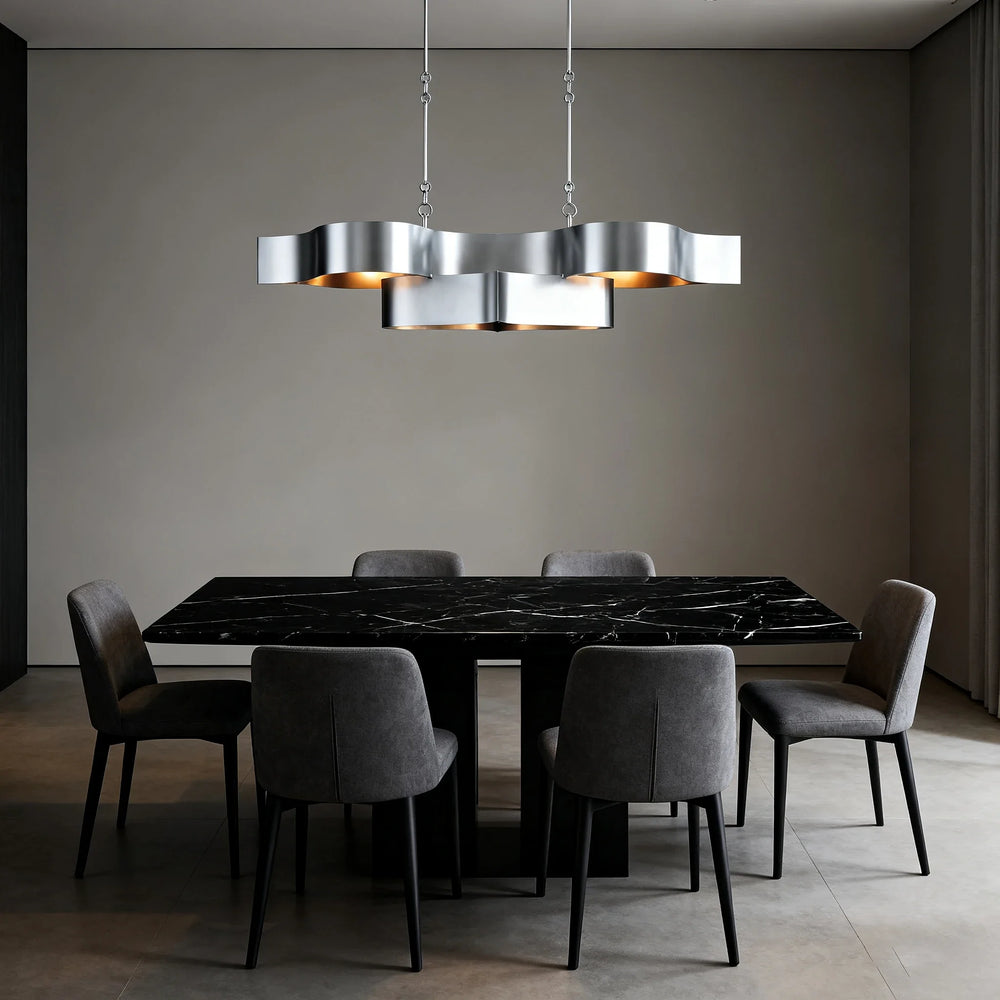 A room setting with a gold floral semi-flush ceiling light providing warm illumination.