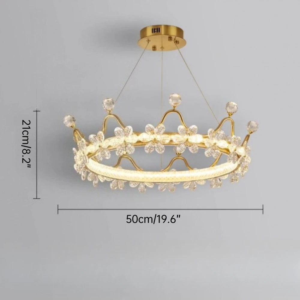 Gold crown-shaped chandelier with dimensions on a gray background