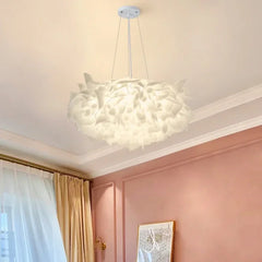 White petal flush mount ceiling light installed on a ceiling.