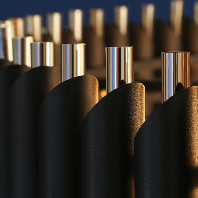 Close-up of metallic cylindrical objects with a blurred background