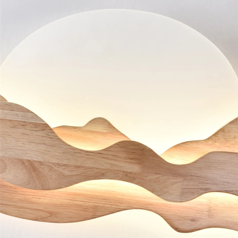 Wooden wall light fixture with a natural finish