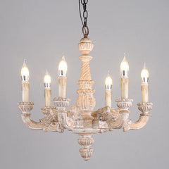 Front view of a distressed wood candelabra chandelier with six candle-style lights against a plain gray background.