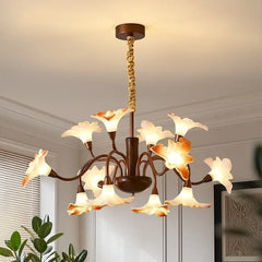 Angled view of the bronze floral bud chandelier pendant light showing its multi-arm structure.