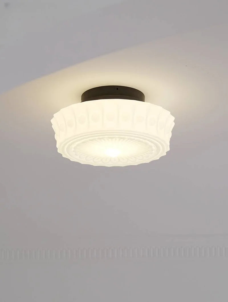 Ceiling light fixture on a plain wall