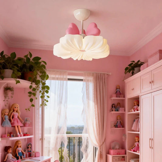 Close-up of the white flower cloud flush mount ceiling light with pink bows, showing its textured surface.