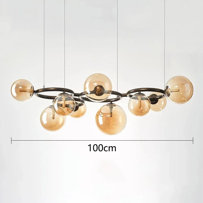 Chandelier with gold bulbs and black metal frame on a white background, labeled '100cm'.