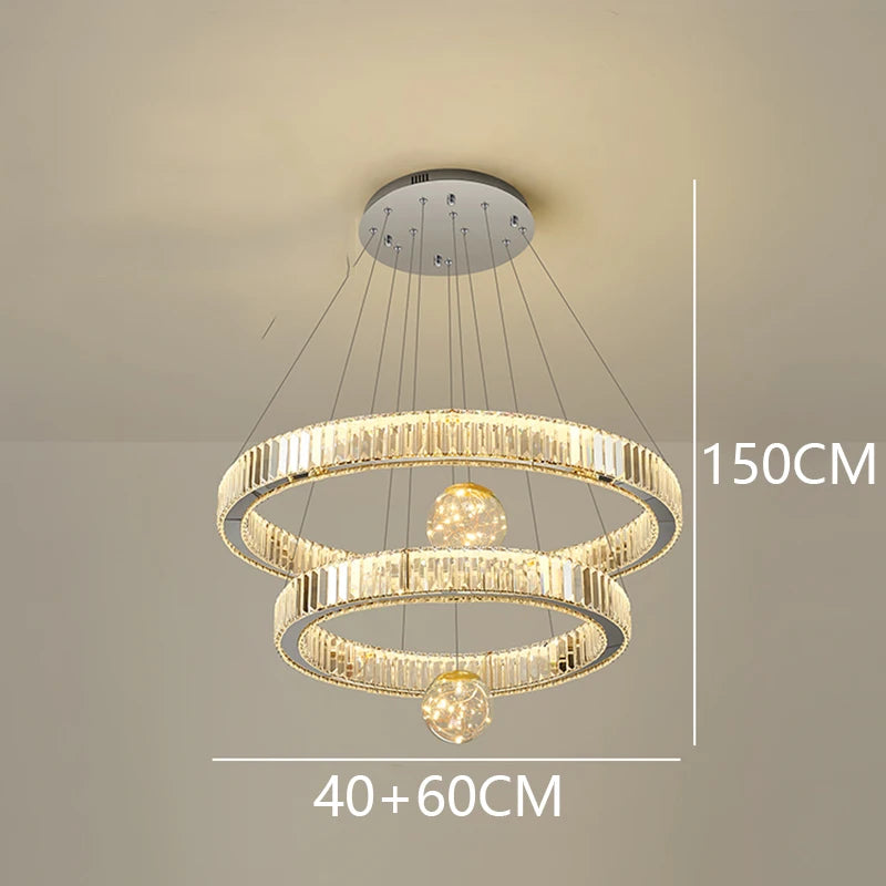 Chandelier with three circular rings on a neutral background, showing dimensions.