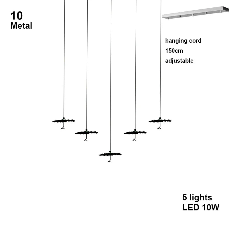 Pendant light fixture with adjustable hanging cord and LED lights on a white background