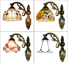 Collage of four Tiffany style wall sconces with stained glass shades in various colors and patterns, including pink lotus, blue check, and white.