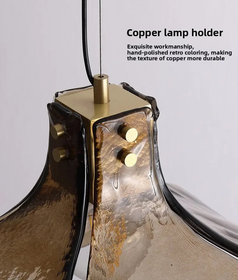 Copper lamp holder with hand-polished retro coloring on a white background