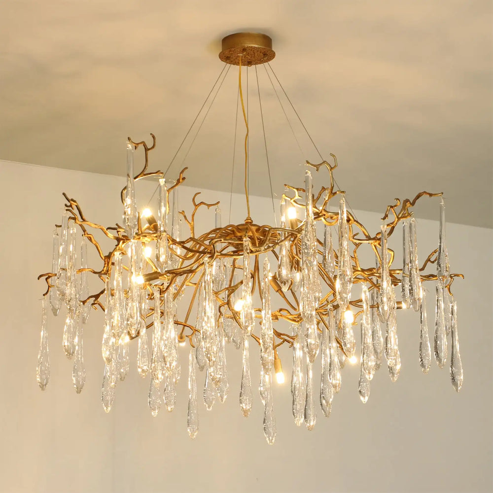 Gold chandelier with crystal elements on a ceiling