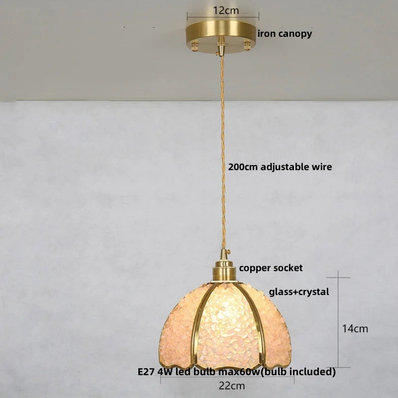 Pendant light with measurements on a plain background
