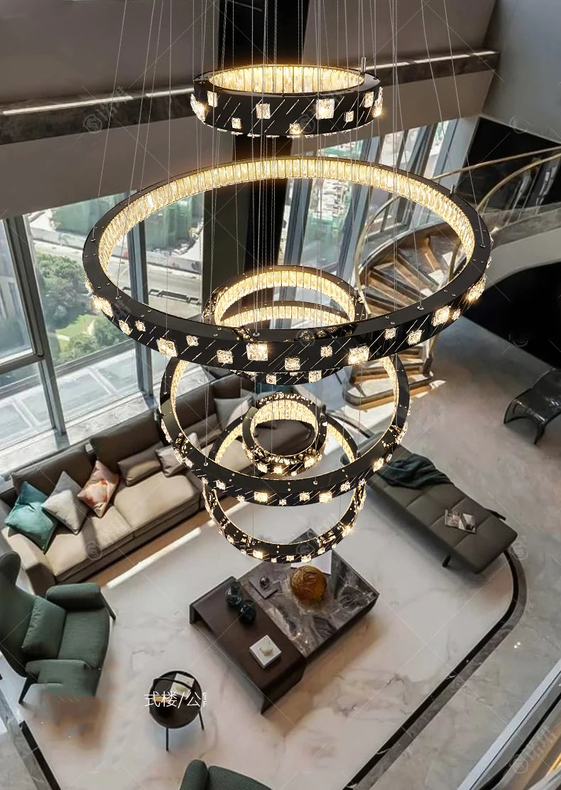 Modern chandelier in a stylish living room with large windows