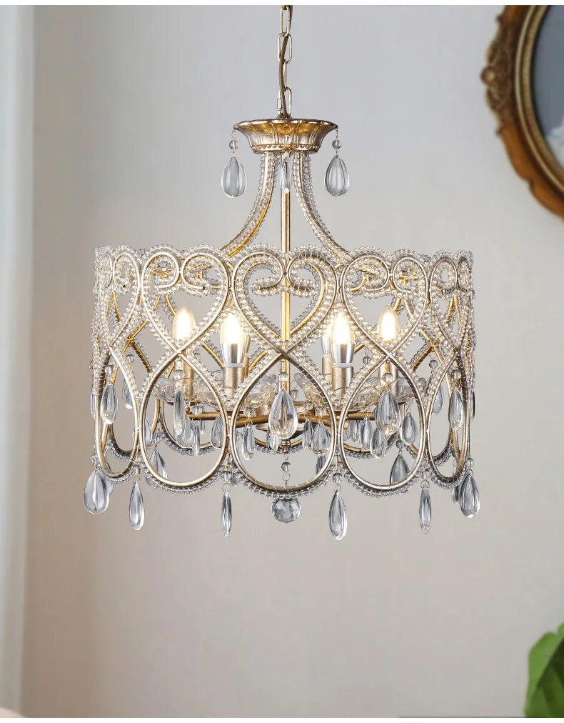 Decorative chandelier with crystal accents on a neutral background