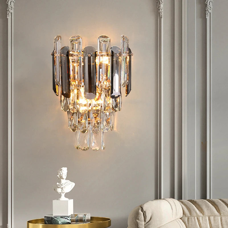 Decorative wall sconce with crystal accents on a neutral wall.