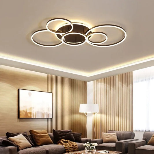 Close-up of the gold finish and interlocking ring design of the flush mount light.