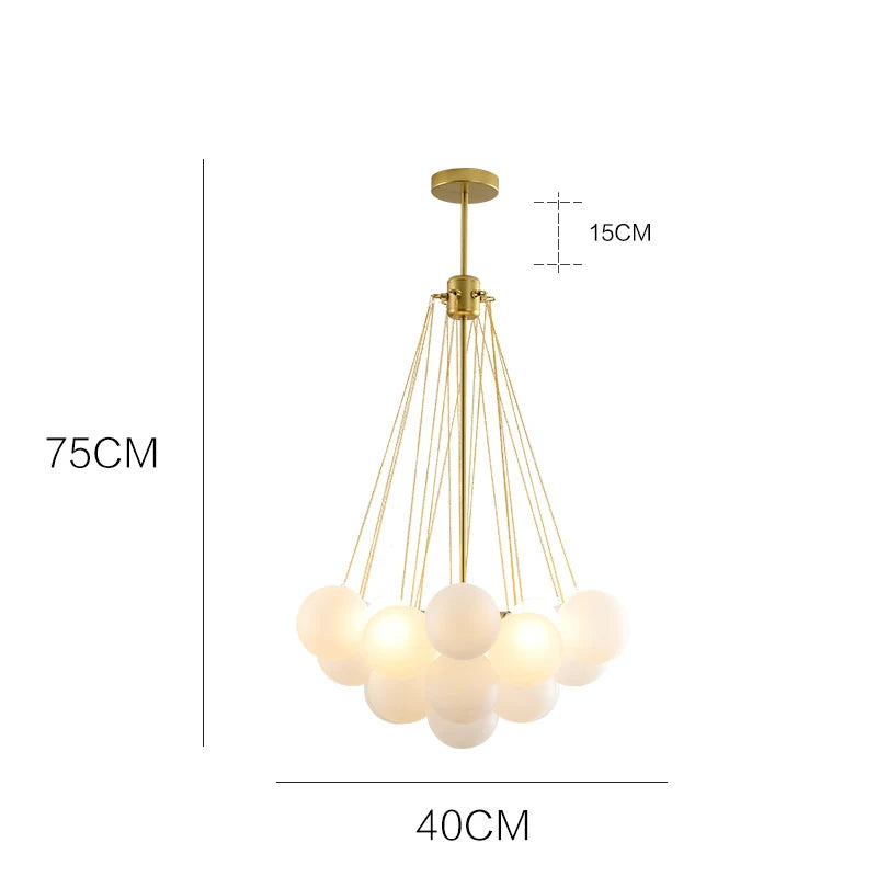 Gold pendant light with measurements on a white background