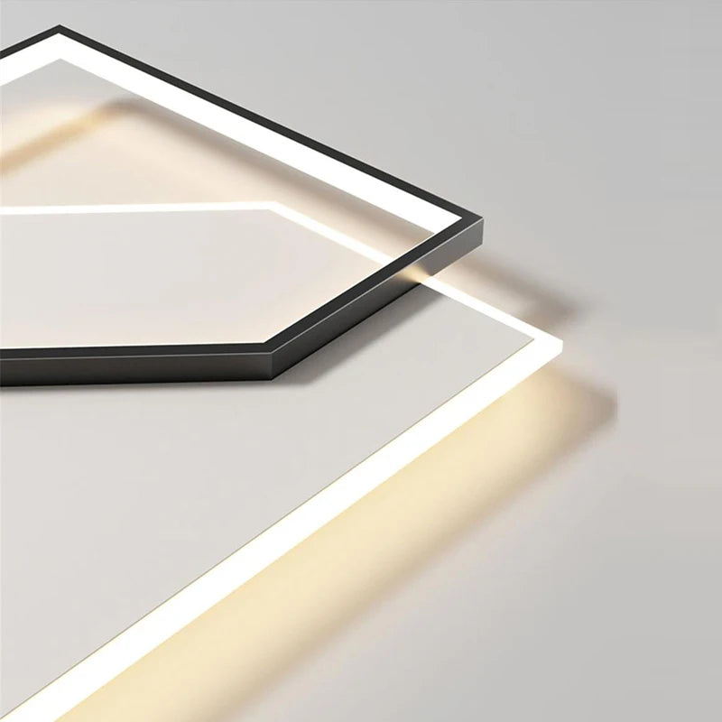 Modern ceiling light fixture on a neutral background