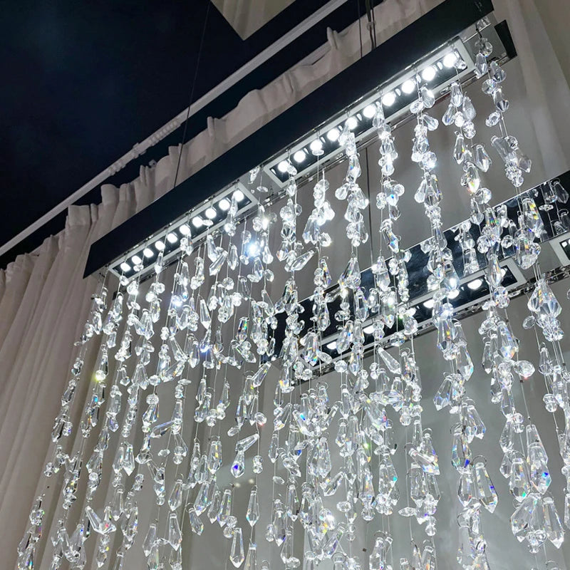 Close-up of a crystal chandelier with a blurred background