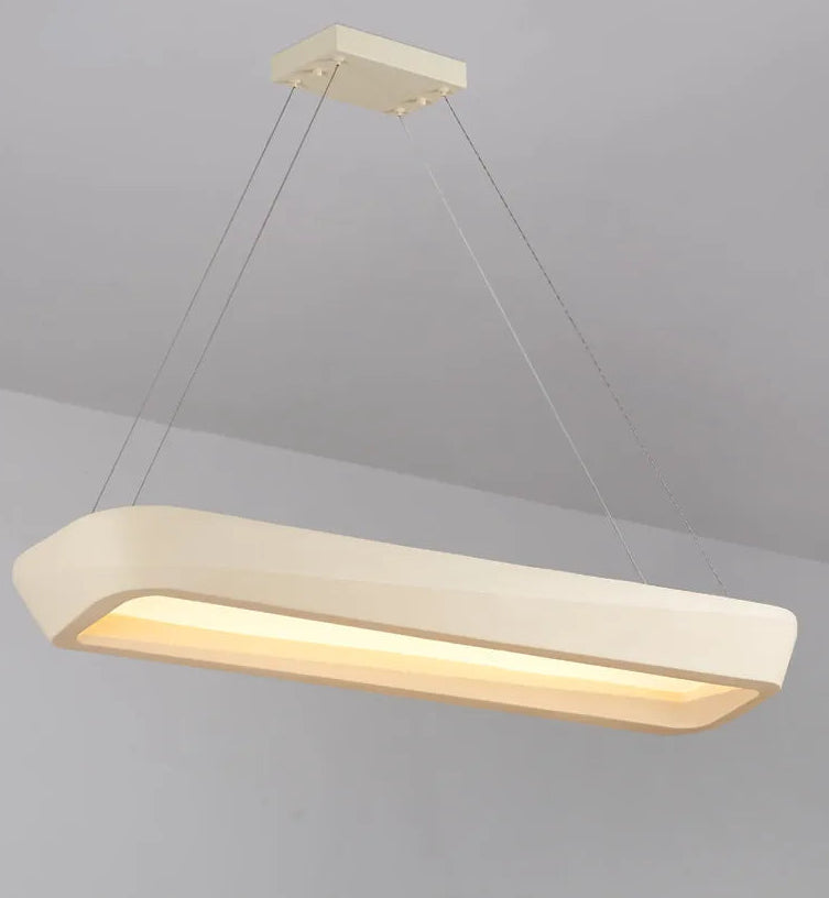 Modern pendant light fixture on a gray background