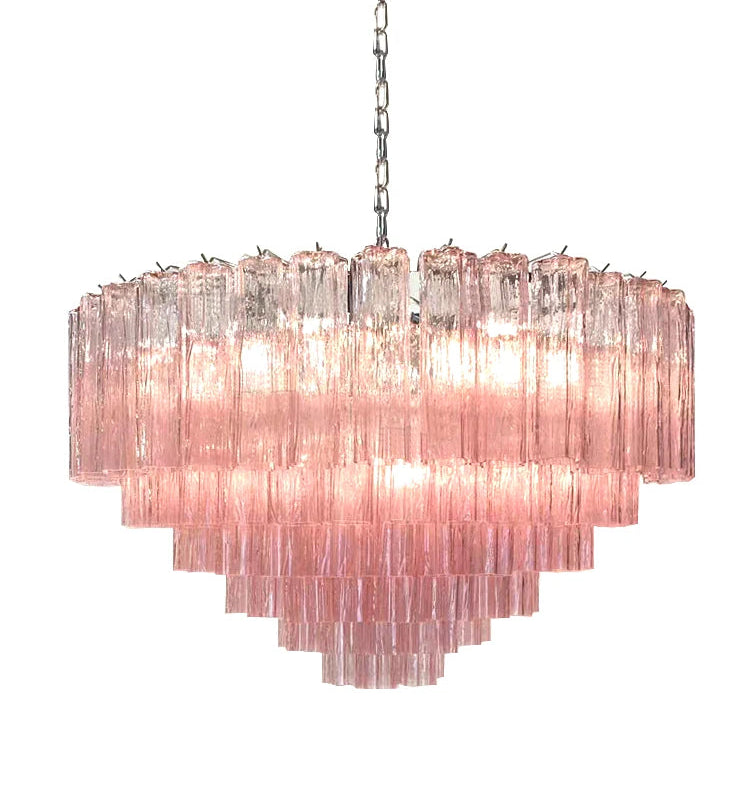 Pink chandelier with multiple tiers on a white background