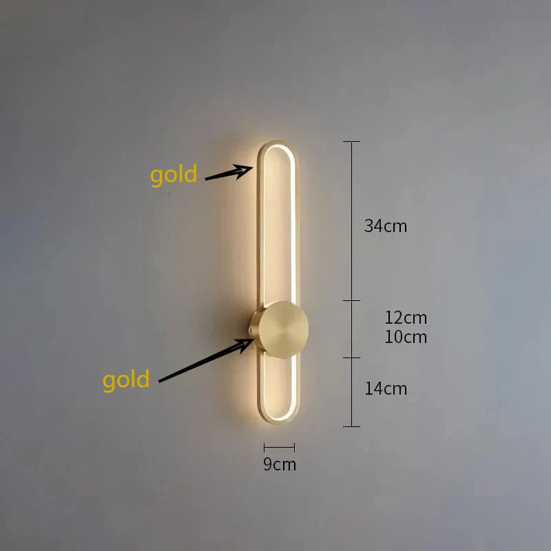 Wall-mounted light fixture with gold accents and measurements on a gray background