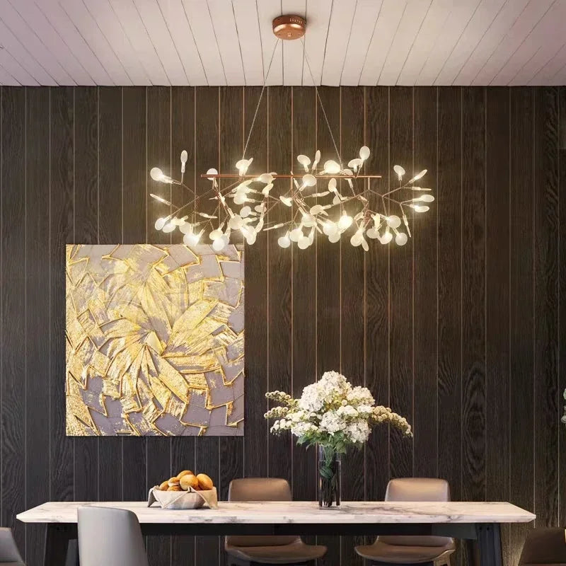 Modern interior with a chandelier, abstract painting, and table setting.