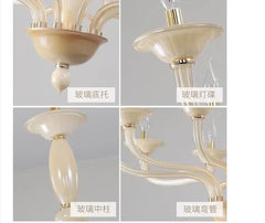 Four close-up images showing details of the chandelier: base, candle socket, central column, and arm joint.