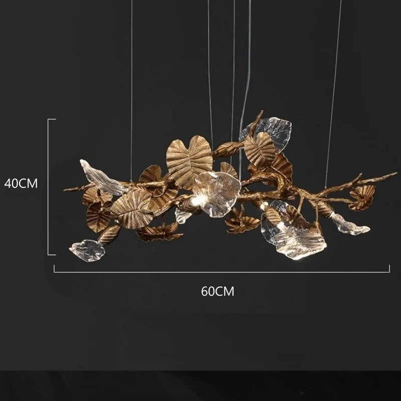 Decorative ceiling light fixture with leaf design on a black background