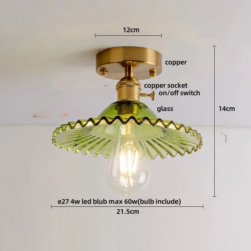 Ceiling light fixture with green glass shade and gold metal components, showing dimensions and bulb information.
