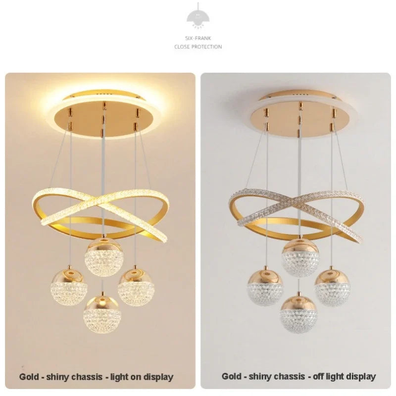 Gold chandelier with crystal balls on a beige and white background