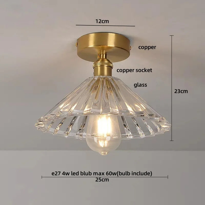 Ceiling light fixture with clear glass shade and gold metal fitting, showing dimensions and bulb information.