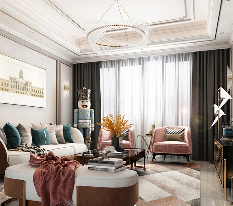 Luxurious living room with modern decor, including a sofa, armchair, and decorative elements.