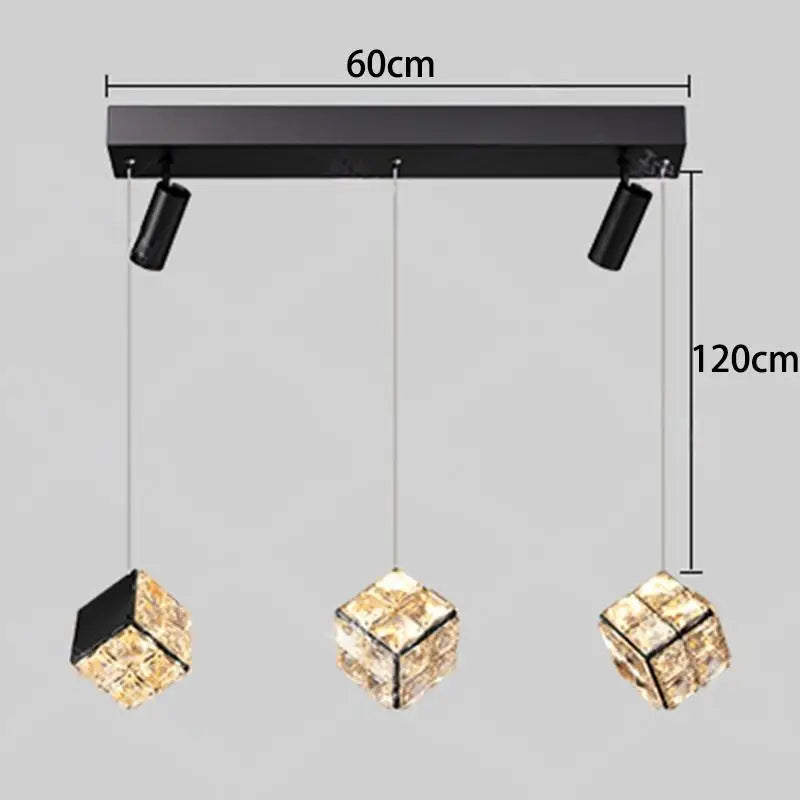 Ceiling light fixture with three crystal lights and dimensions on a gray background