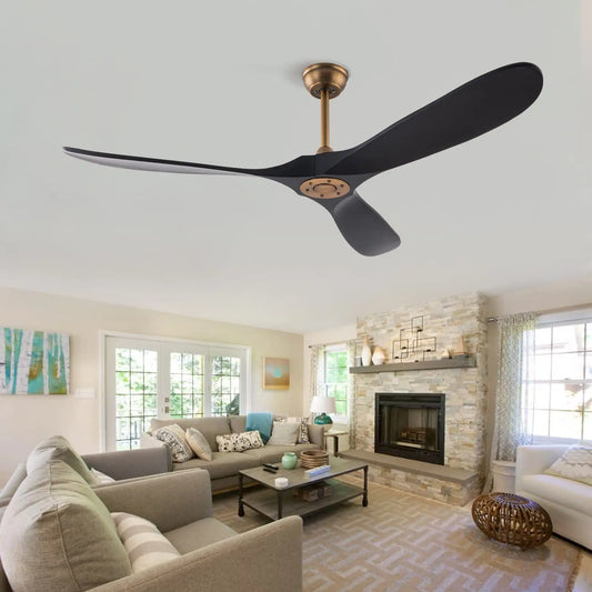 Modern black three-blade ceiling fan with wood accents, mounted on a white ceiling in a living room.