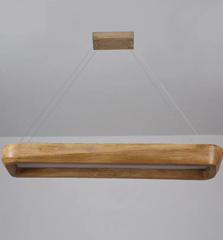 Wooden pendant light fixture on a gray background