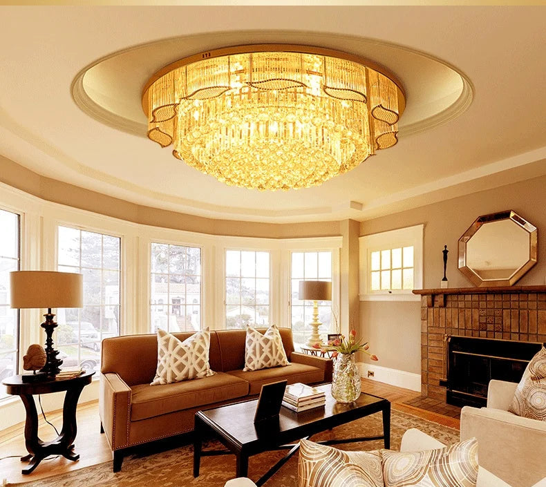 Living room with a chandelier, sofa, and coffee table.