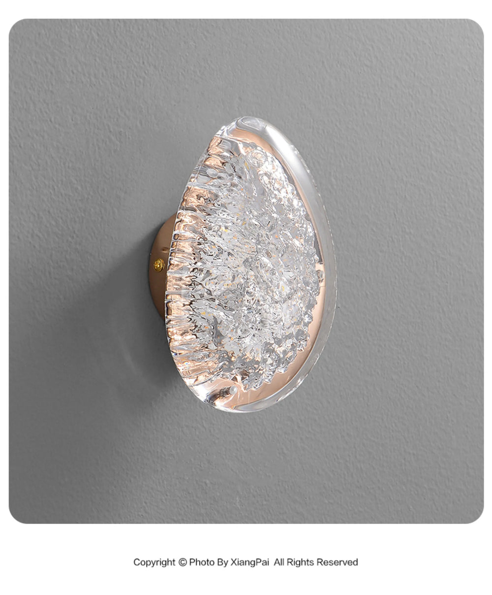 Decorative door handle with a textured design on a gray background