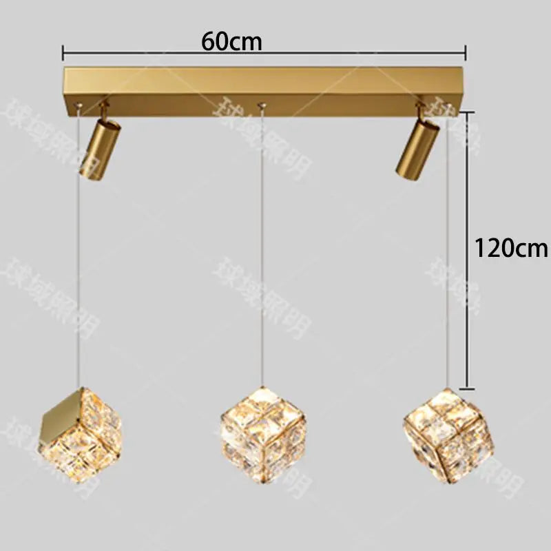 Gold ceiling light fixture with crystal shades and measurements on a gray background
