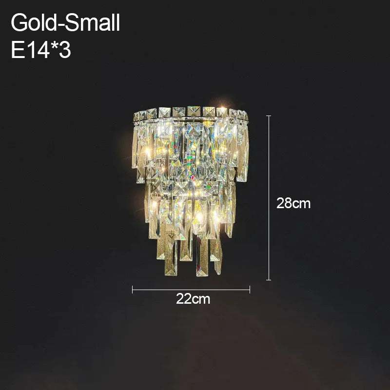 Small gold chandelier with dimensions on a dark background
