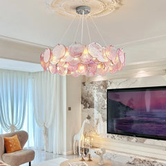 Close-up view of the pink crystal chandelier, showcasing the texture and arrangement of the glass discs.