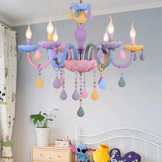 Pastel macaron crystal chandelier with floral details, installed in a child's bedroom with Mickey Mouse curtains.