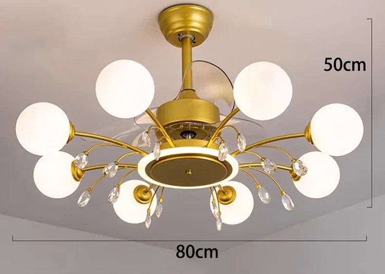 Gold chandelier with white glass shades on a gray background